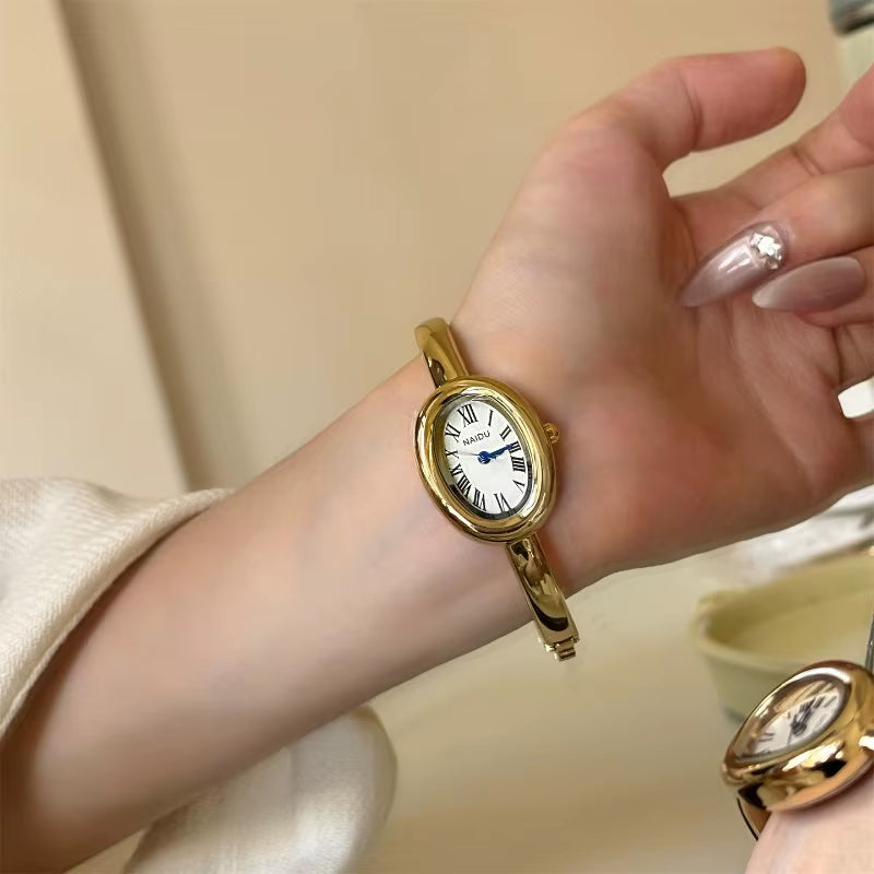 Simple and Stylish Roman Scale Women'S Bracelet Watch Oval Quartz Watch